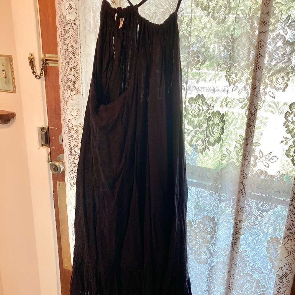 Black sleeveless cotton dress, ruffle bottom